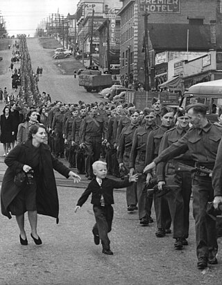 "Wait for me daddy":British Columbia Regiment, DCO, marching in New Westminster, 1940